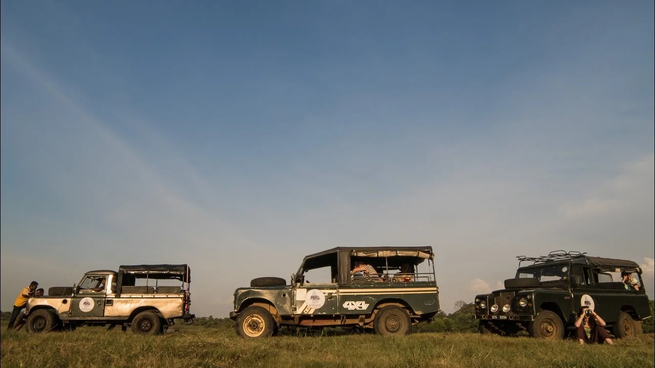 Safari vehicles in the Sri Lankan landscape from the SLWCS volunteer film